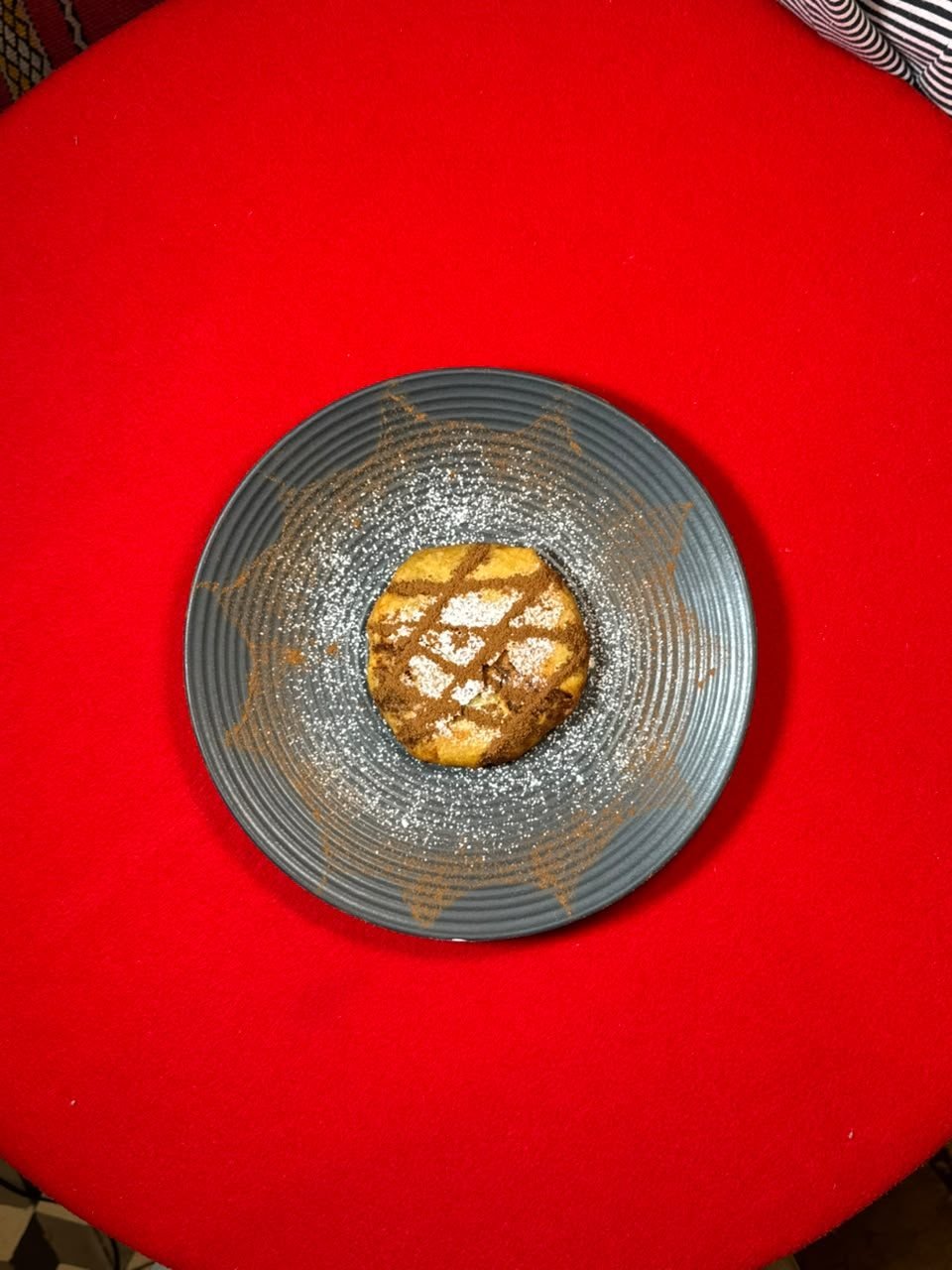A Moroccan dessert dusted with icing sugar and cinnamon